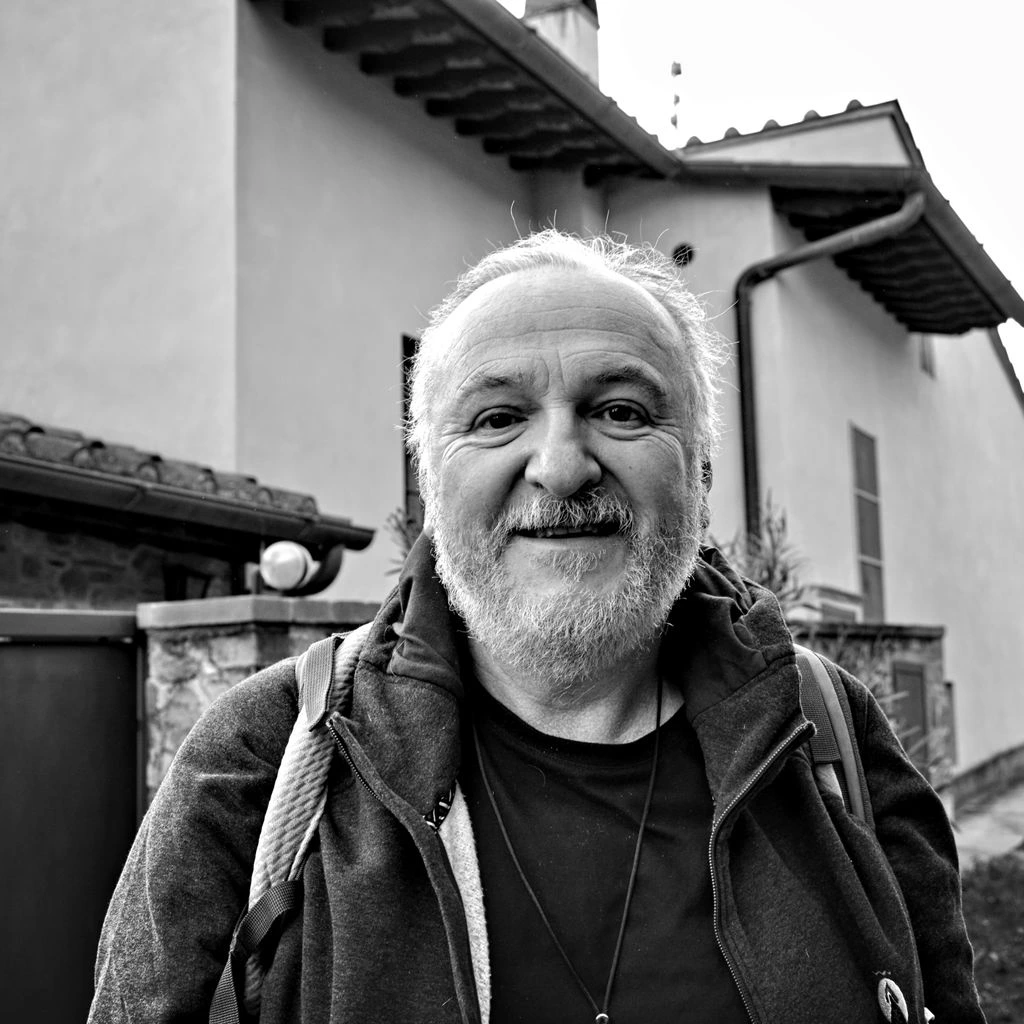 Portrait of an Italian fossil preparator in his Tuscan laboratory.